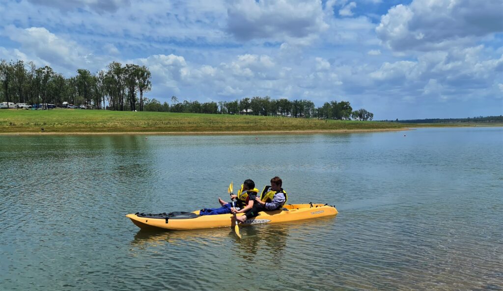 Image of Matthew and Lone kayaking
